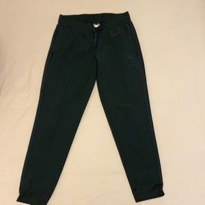 Dark green adidas track pants